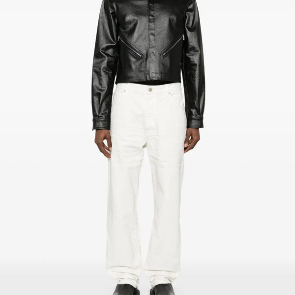 Close-up of Balenciaga pants hardware and fine stitching
