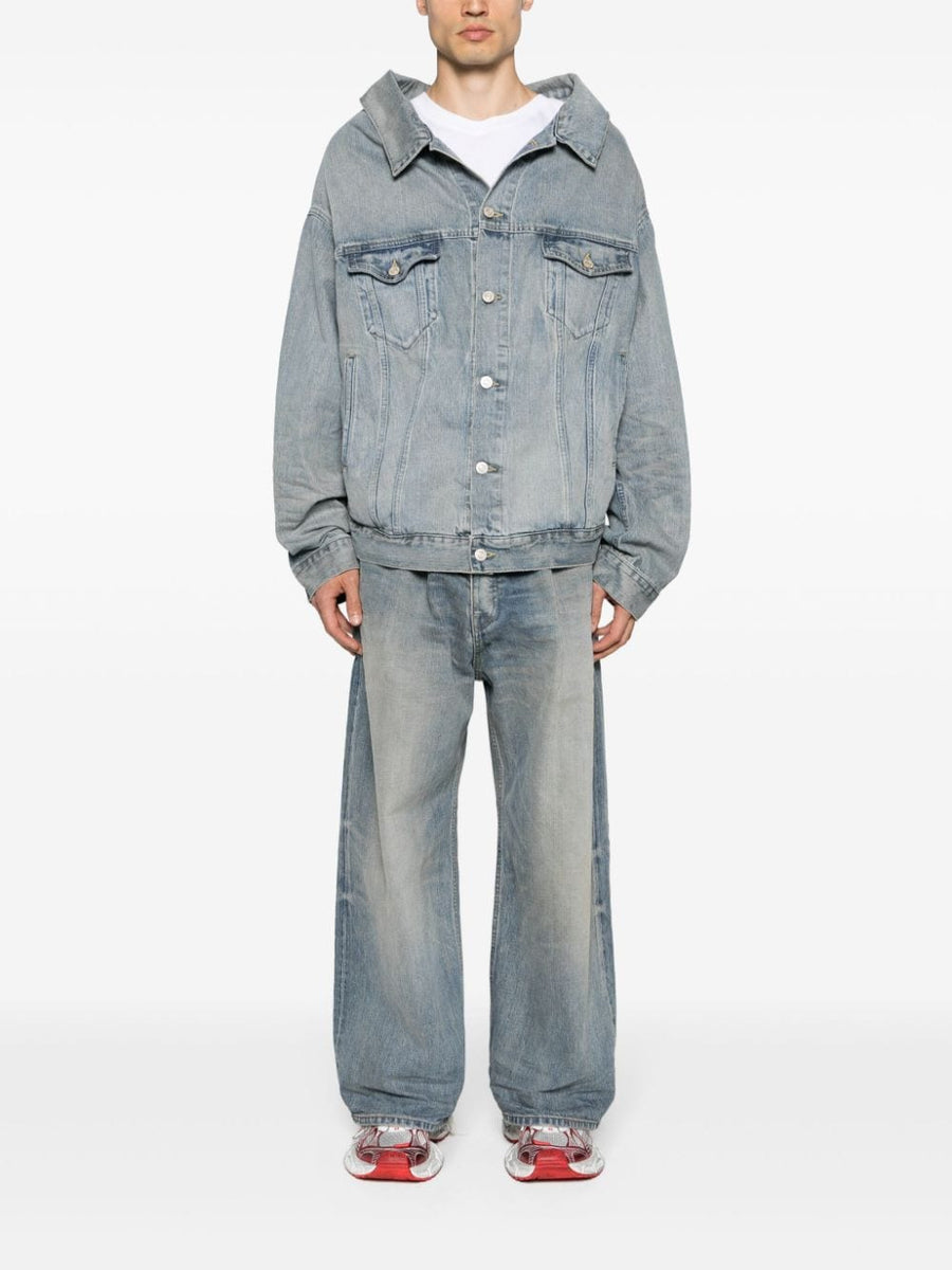 Close-up of Balenciaga outerwear hardware and fine stitching