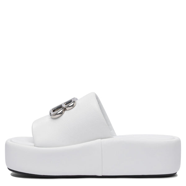 Close-up of Balenciaga sandals hardware and fine stitching