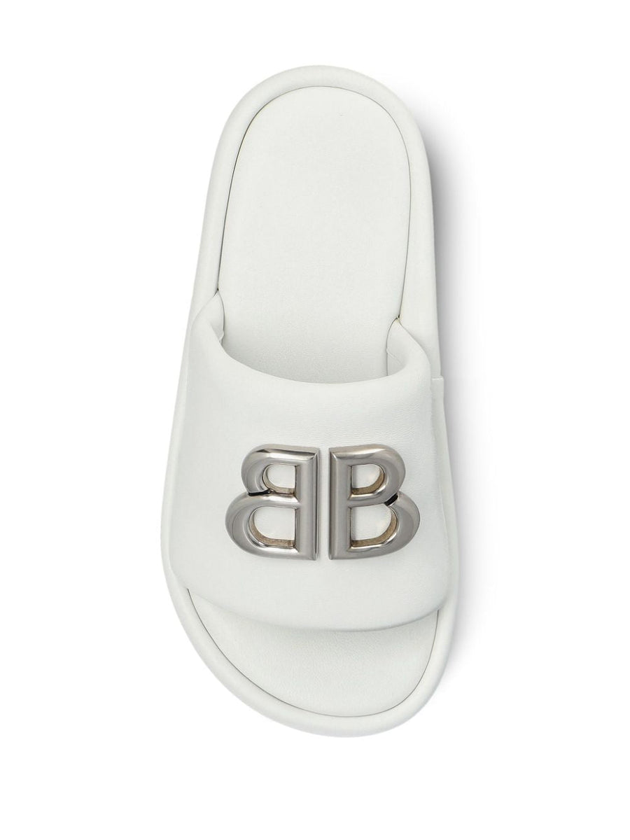 Close-up of Balenciaga sandals hardware and fine stitching