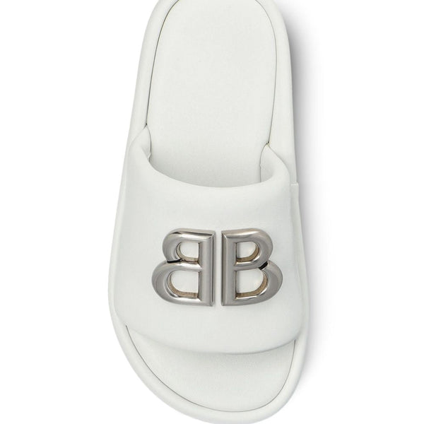 Close-up of Balenciaga sandals hardware and fine stitching