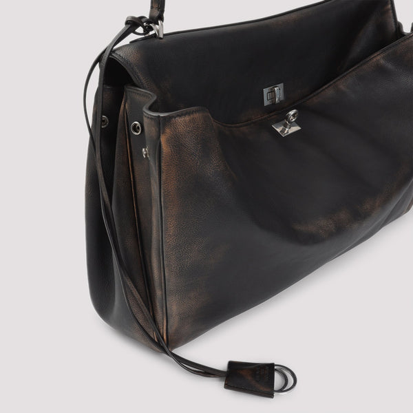 Close-up of Balenciaga handbags hardware and fine stitching