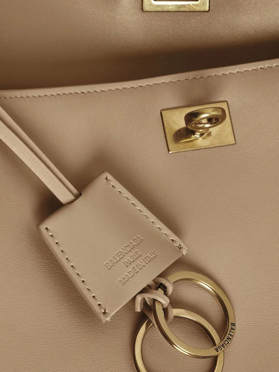 Close-up of Balenciaga handbags hardware and fine stitching