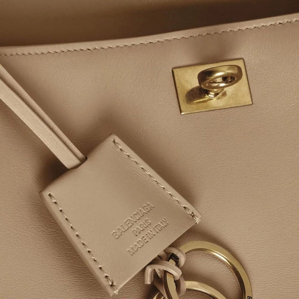 Close-up of Balenciaga handbags hardware and fine stitching