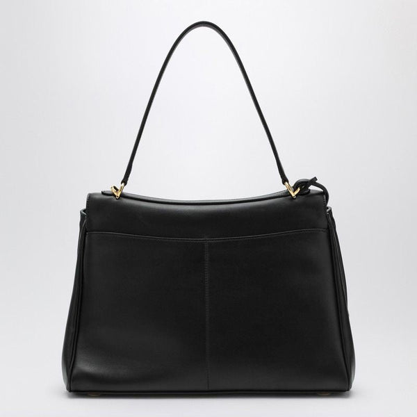 Close-up of Balenciaga handbags hardware and fine stitching