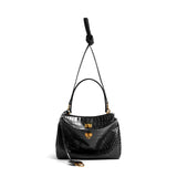 Close-up of Balenciaga handbags hardware and fine stitching