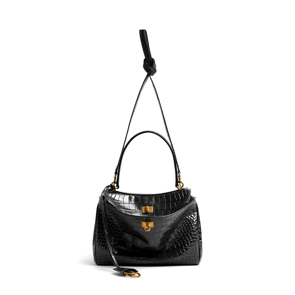 Close-up of Balenciaga handbags hardware and fine stitching