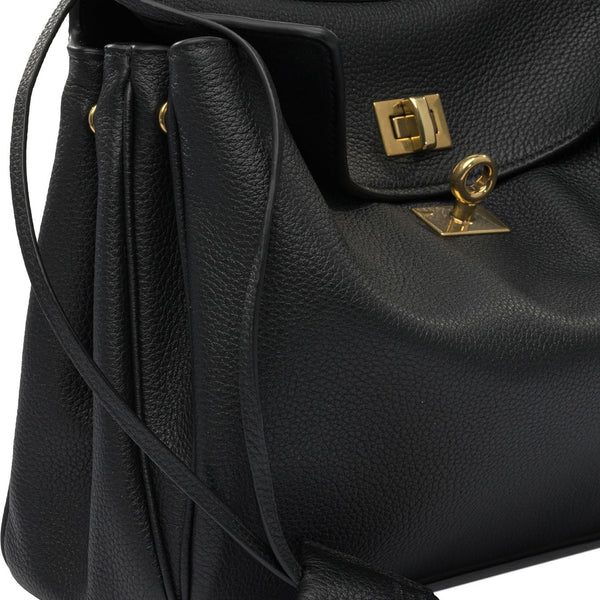 Close-up of Balenciaga shoulder bags hardware and fine stitching