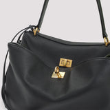 Close-up of Balenciaga shopping bags hardware and fine stitching