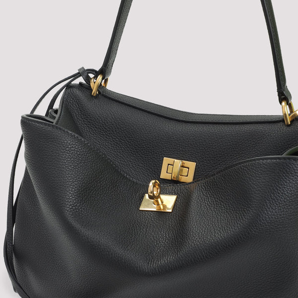 Close-up of Balenciaga shopping bags hardware and fine stitching