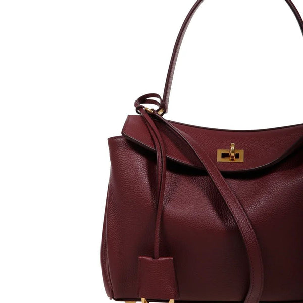 Close-up of Balenciaga handbags hardware and fine stitching