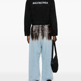 Balenciaga outerwear lifestyle shot premium designer piece