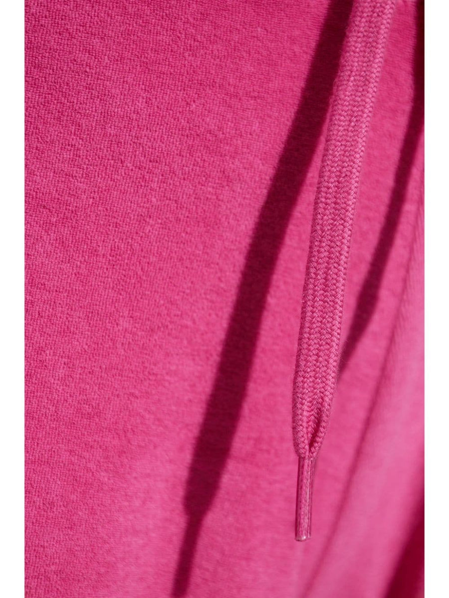 Close-up of Balenciaga pants hardware and fine stitching