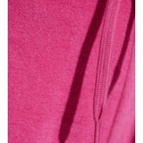 Close-up of Balenciaga pants hardware and fine stitching