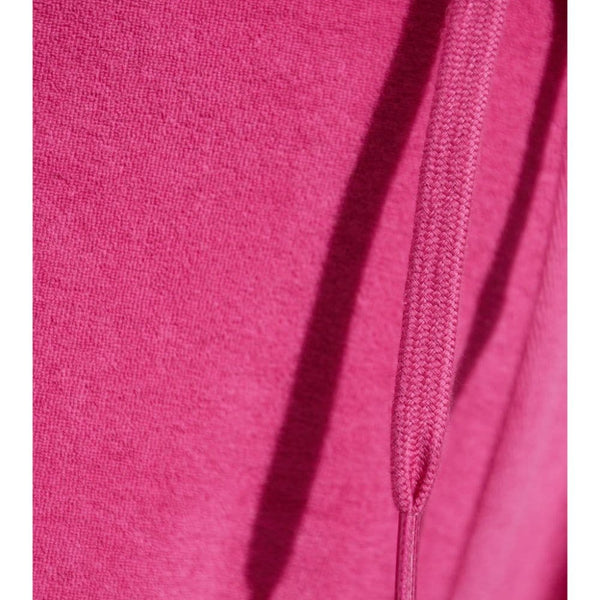 Close-up of Balenciaga pants hardware and fine stitching