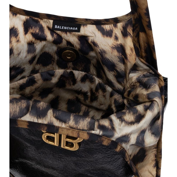 Close-up of Balenciaga handbags hardware and fine stitching