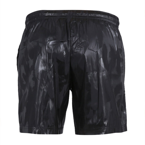 Close-up of Alexander McQueen swimsuits hardware and fine stitching