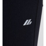 Close-up of Balenciaga pants hardware and fine stitching
