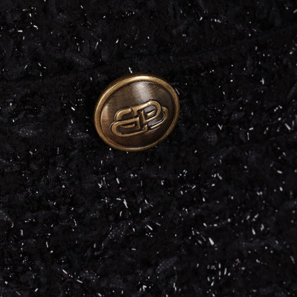 Close-up of Balenciaga jerseys & knitwear hardware and fine stitching
