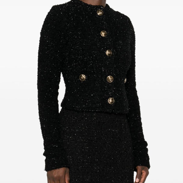 Close-up of Balenciaga jerseys & knitwear hardware and fine stitching