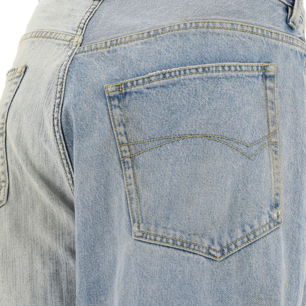 Close-up of Balenciaga pants hardware and fine stitching