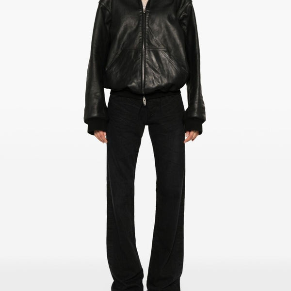 Close-up of Balenciaga pants hardware and fine stitching
