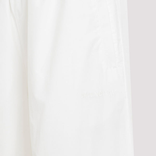 Close-up of Balenciaga pants hardware and fine stitching