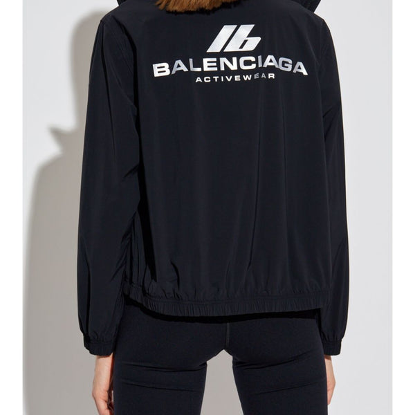 Close-up of Balenciaga outerwear hardware and fine stitching