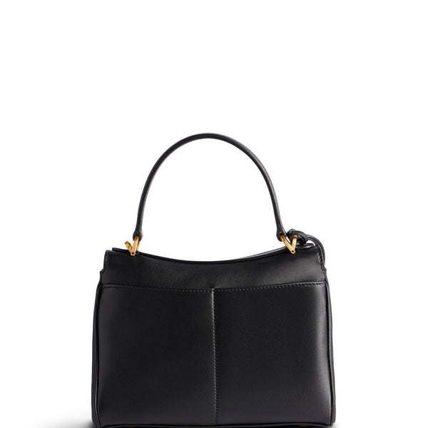 Close-up of Balenciaga handbags hardware and fine stitching