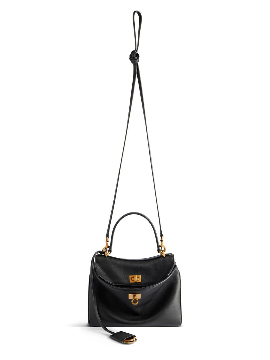 Close-up of Balenciaga handbags hardware and fine stitching