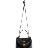 Close-up of Balenciaga handbags hardware and fine stitching