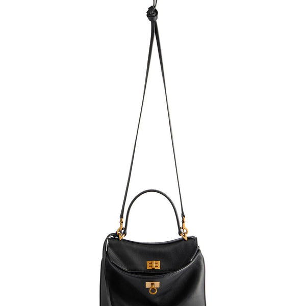 Close-up of Balenciaga handbags hardware and fine stitching