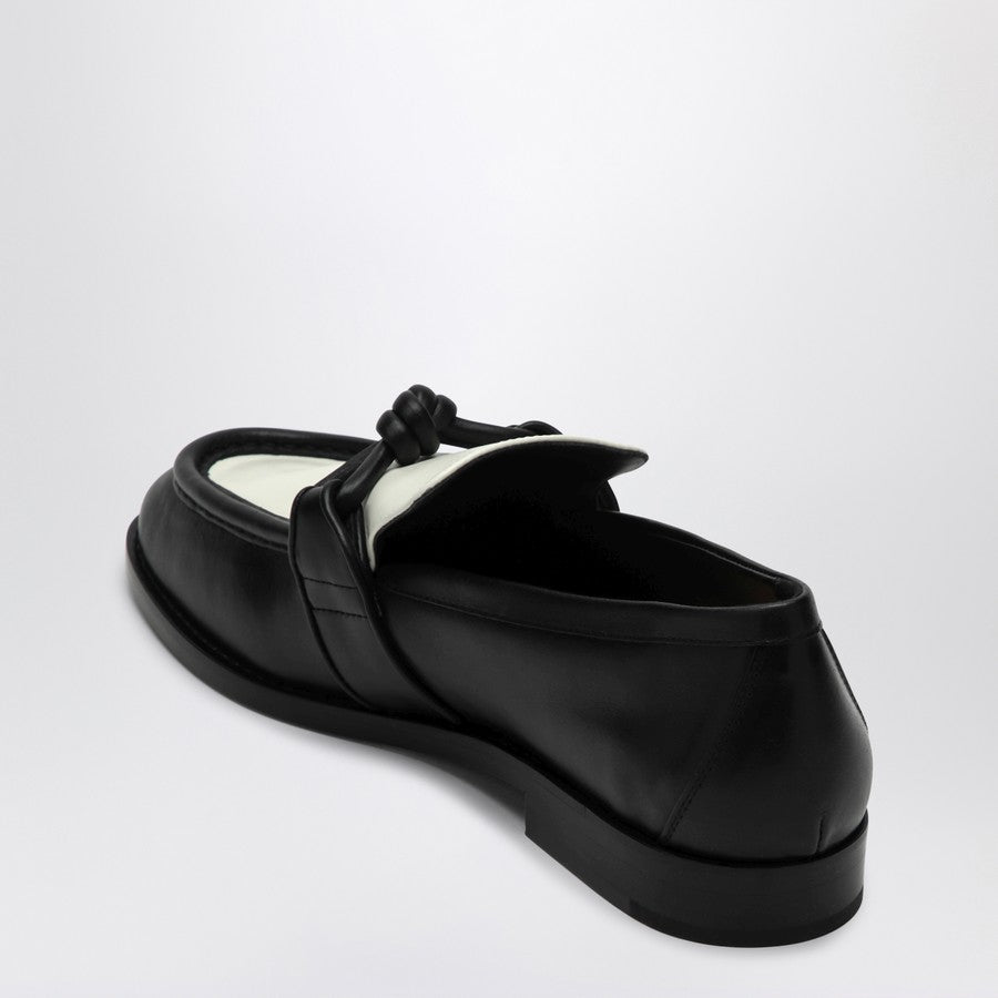 Close-up of Bottega Veneta flats hardware and fine stitching