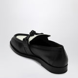 Close-up of Bottega Veneta flats hardware and fine stitching
