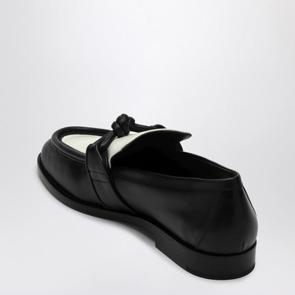 Close-up of Bottega Veneta flats hardware and fine stitching