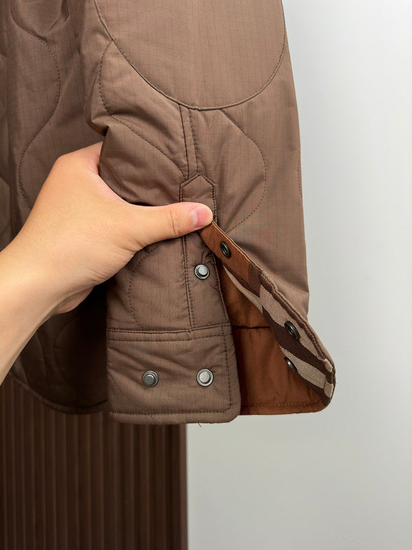 Side profile view of Burberry luxury piece style No.387