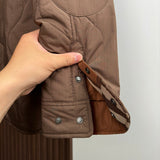 Side profile view of Burberry luxury piece style No.387