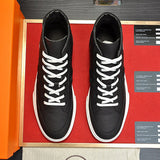 Hermès Black Slip-On Sneakers - Full Silhouette View