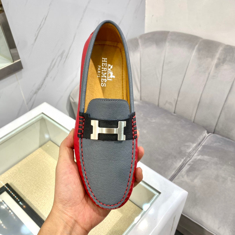 Hermès Tan High-Top Sneakers - Angled View