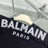 Texture and finish detail of Balmain luxury piece style No.084