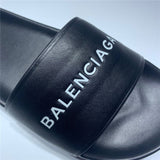 Balenciaga Red Slide Sandals - Close-Up Texture View