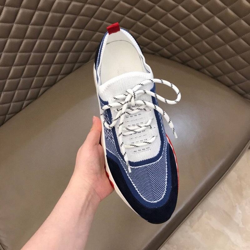 Hermes shoes Style 213 - close-up of statement logo accent
