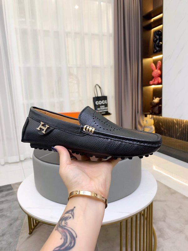 Hermès Tan High-Top Sneakers - Angled View