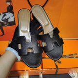Hermes sandals Style 009 - angled studio shot