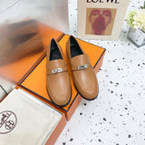 Hermès White Crisscross Strap Sandals - Angled View