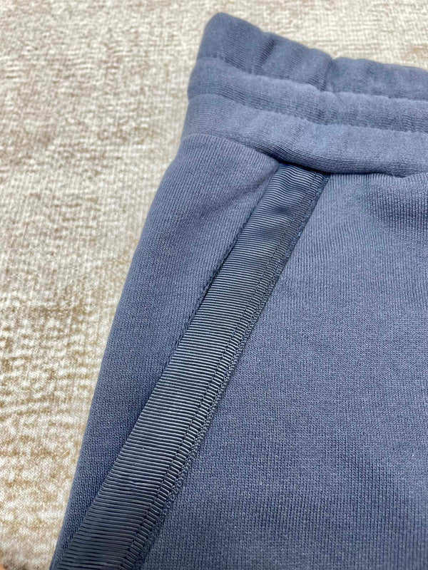 Three-quarter angle view of Amiri luxury piece style No.052