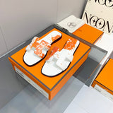 Hermès Tan Slide Sandals - Sole Detail View