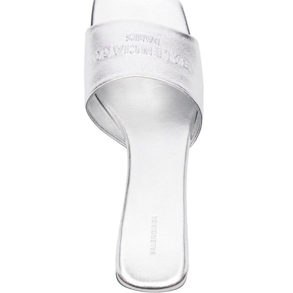 Close-up of Balenciaga sandals hardware and fine stitching