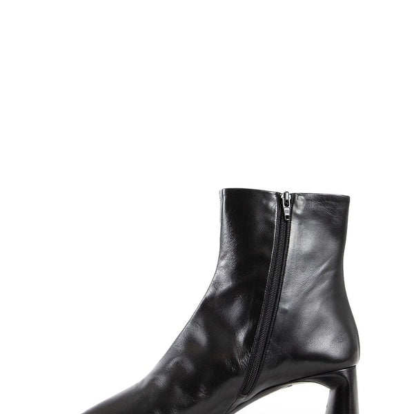 Close-up of Balenciaga boots hardware and fine stitching