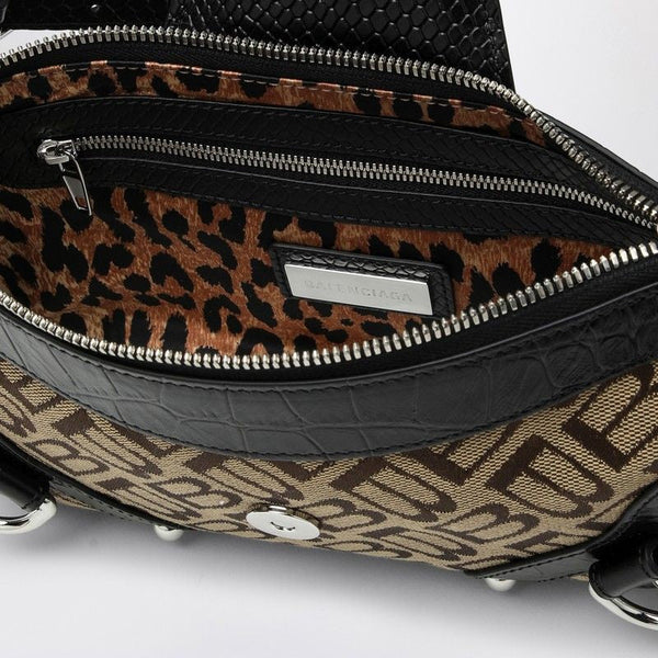 Close-up of Balenciaga shoulder bags hardware and fine stitching